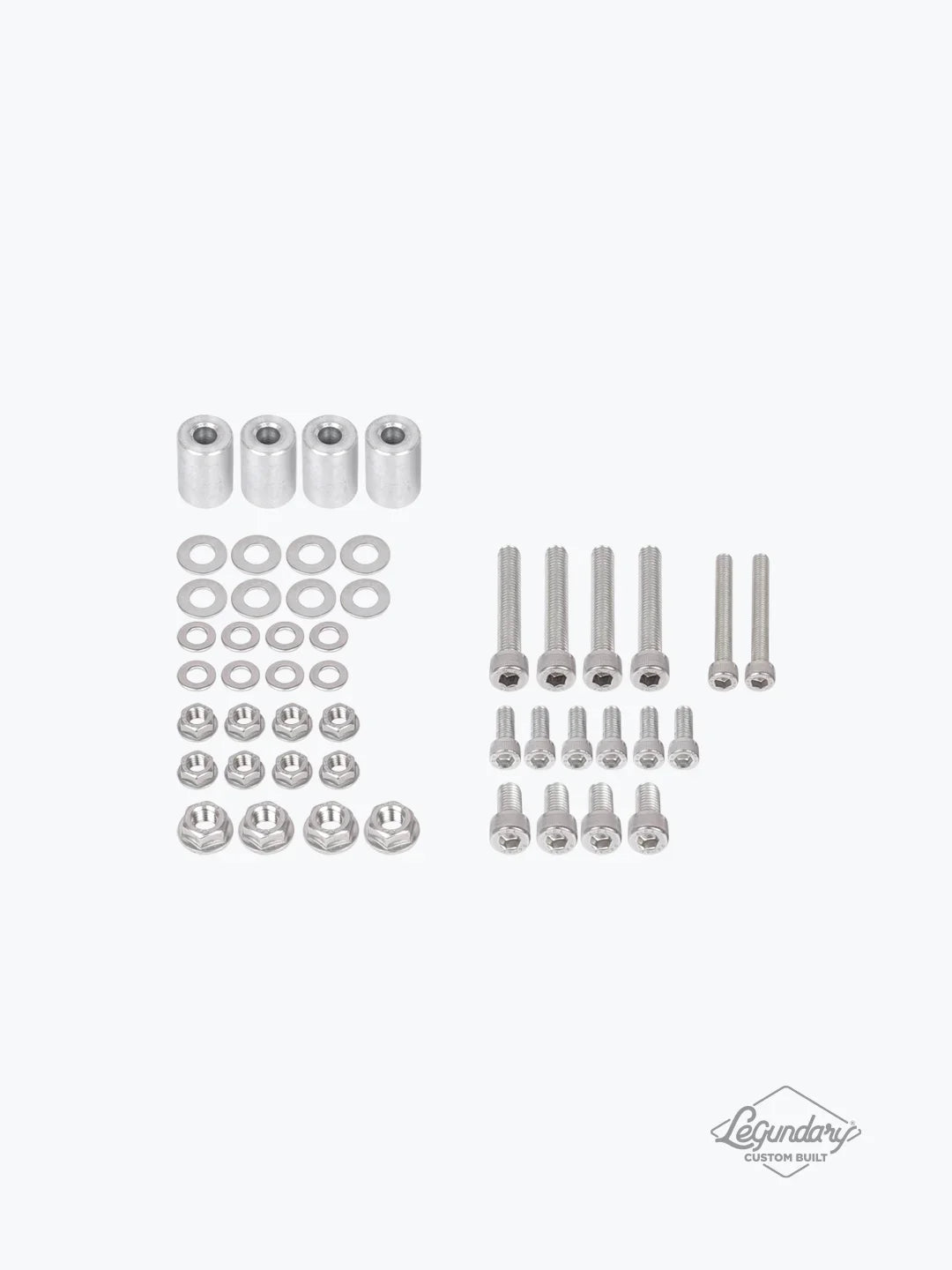 Motorcycle saddle stay and carrier hardware kit with bolts, spacers, washers, and nuts arranged on a white background.