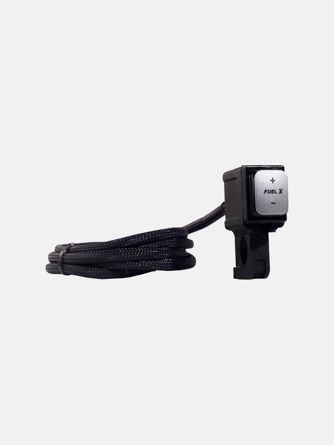 Motorcycle handlebar mounted Fuel X controller switch with attached cable on white background