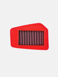 Red motorcycle air filter with rectangular pleats on a plain white background