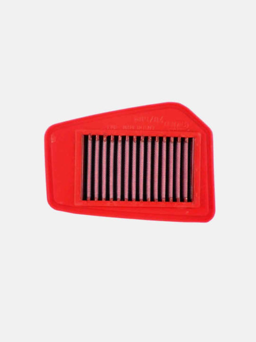 Red motorcycle air filter with rectangular pleats on a plain white background