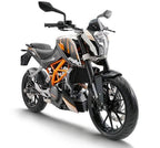 Sporty black and orange street motorcycle with aggressive styling on white background