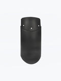 Black motorcycle mudguard extender with mounting holes, isolated on white background