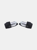 Pair of black and silver motorcycle handlebar end weights on white background